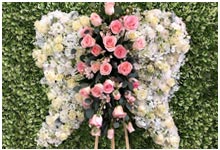alas de flores para funeral